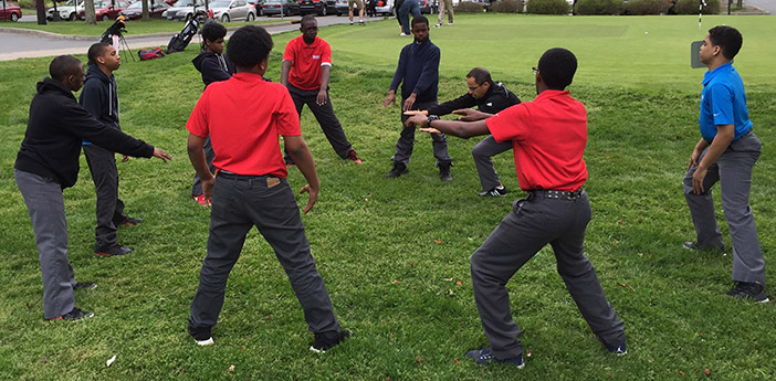 Our students and Teaching Professional Todd Bordonaro getting loose with lateral lunges at Dunwoodie.