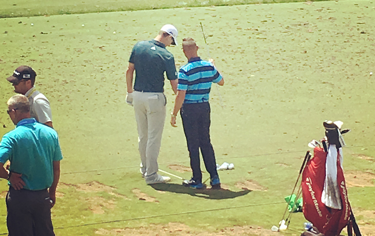 Foley with Justin Rose, one of the players he teaches.