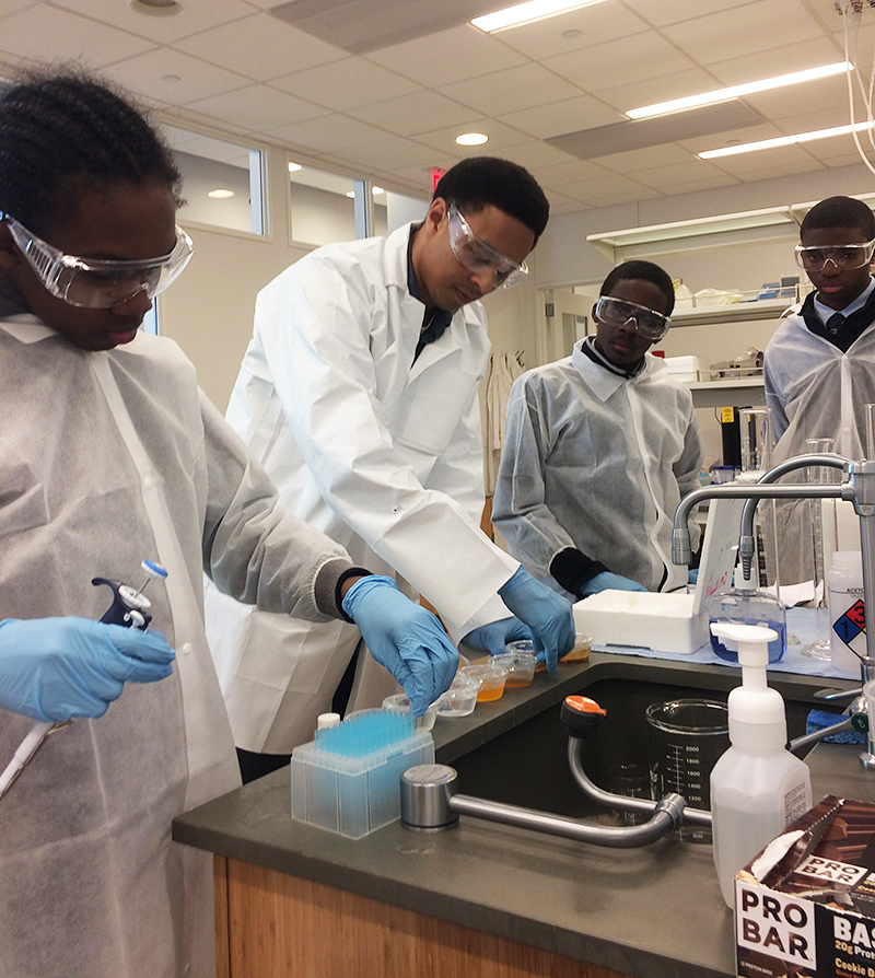 Triniim Jones, Dr. Jared Day, Kyle Barthelmy and Tariq Washington in the lab at CCNY