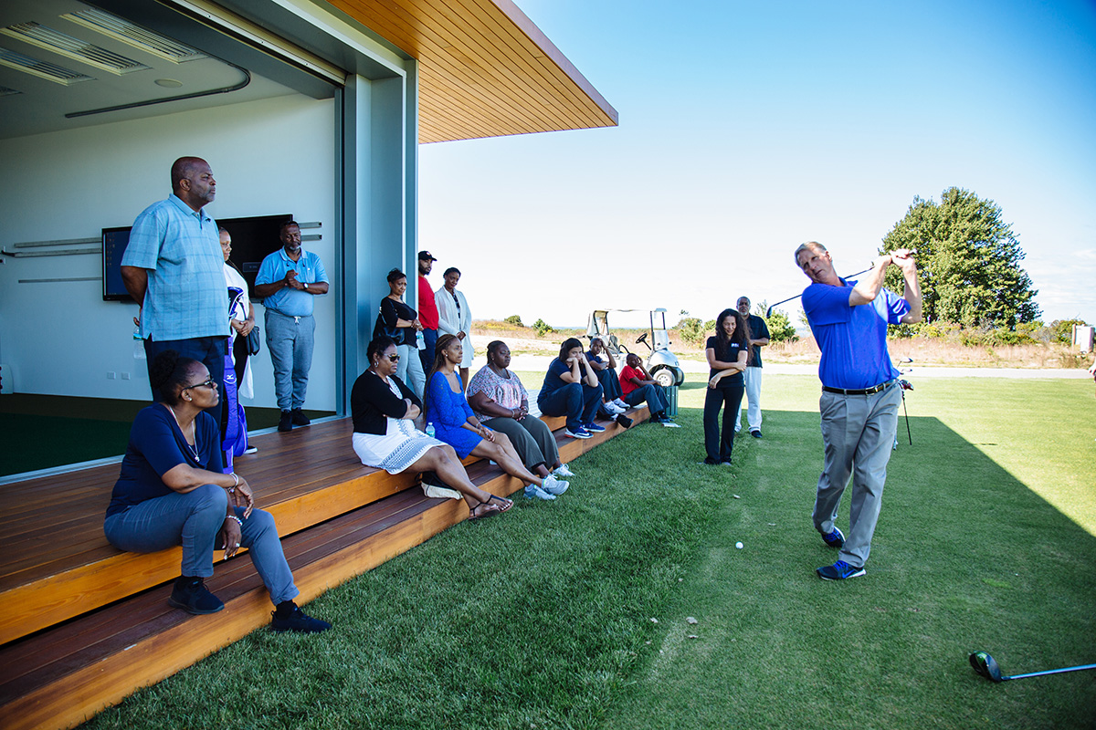 Jeff Warne, director of golf at The Bridge, gave a clinic to the Foundation families who came out for the day.
